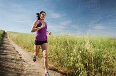 jogging woman path through field mid adult dissolve stock tetra d1028