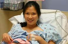 pregnant birth surgical asian girls stock giving