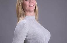 woman middle aged wearing stock portrait tight fitting shirt grey attractive hands