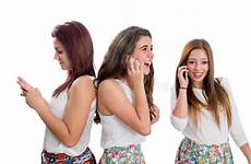 teen threesome phones girls talking smart stock