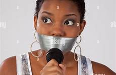 tape woman mouth gagged duct over her girl holding stock microphone alamy pretty tied