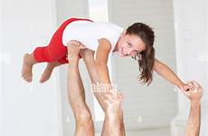 yoga father daughter doing lift stock alamy