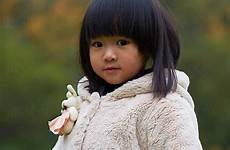 asian little girl outdoor stocksy