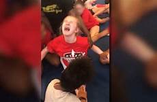 forced splits cheerleaders do girl year old force cheerleading her sobbing shows after strip pain coach while police athletic principal