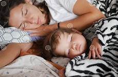 sleeps mother mom sofa sleep peacefully lying safe bedroom bed boy baby cute his child during