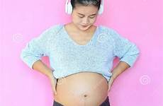 pregnant belly headphones tummy