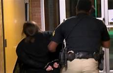 superintendent arrest handcuffs