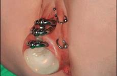piercings pussy genital scarification femdom genitals decorated
