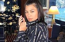 kardashian kourtney smoking bikini cigarette her while shirt chanel posing holds italy wore reveal yacht open star vintage year life