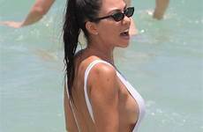 kardashian kourtney swimsuit white beach sexy miami body slinky piece sideboob back story relaxes shows she off her nude hawtcelebs