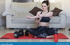 stretching dumbbells