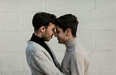 gay kissing couple portraits stocksy javier