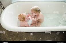 bath sister bathing baby siblings washing girl stock together alamy young bathtub