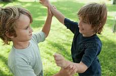 boys fighting stock kids fight study two other parents spank still spanking dissolve bullying sibling hurts too photoalto science support