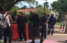 flag manhart playboy force air arrested michelle trampling protesters vet were being taking campus veteran seen she valdosta georgia photograph