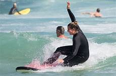 fiona beach surfboard bondi falkiner stand her splash sydney surf lessons squat tumbling ocean half making before into only made
