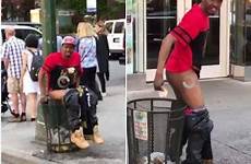 man street bin dump takes poop busy york pooping public waste inside broad daylight streets caught city camera nigeria american