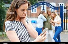 girl alamy bullied teenage message being text