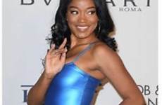 elton keke palmer john charity gala fashionista turns heads leggy latex getty courtesy actress shows mini beauty blue her