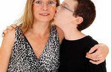 kissing mother boy son his her little mom young kiss hugging stock him