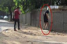 peeing woman caught video streets people road india reacted