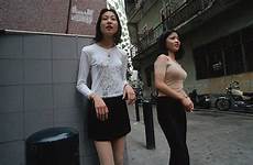 prostitutes china young waiting customers mainland along city streets narrow old