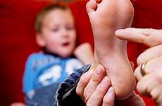 feet kids tickling stock