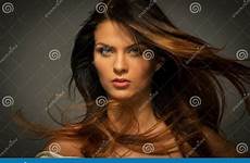 seductive brunette woman hair stock