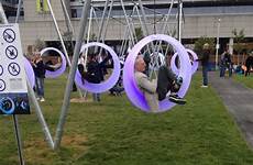 swings adult playground playful