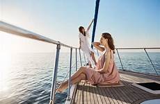 boat yacht woman dreamy attractive bow adult stands tender spending female time hot sailing feeling sunbathing shot outdoor look girl