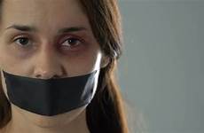 mouth tied taped sad woman preview kidnapping helpless victim hands showing