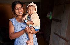sri lankan girl mother baby stock