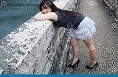over bending asian girl cute viewer looking
