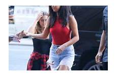 selena gomez jeans nyc ripped style fashion june street outfits summer york top braless red nipple tank high halter waisted