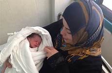 gaza women israel baby pregnant newborn girl hospital her mom shifa holds huffpost conflict toll takes sena delivering alissa batoul