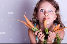 eating girl carrots young alamy fresh child sweet white