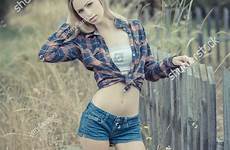 sassy teen girl fence posing next flannel shorts jeans wearing shutterstock stock