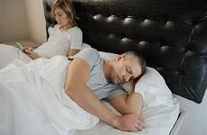 asleep wife husband while mobile using