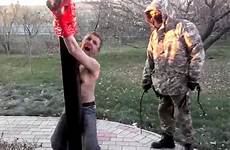 ukraine soldiers man alive dead russian ukrainian whipped burying russia donetsk drug dealer shows footage region