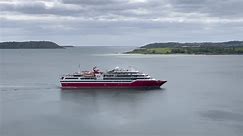 SailCork.com - Small , luxury cruise ship heading upriver...