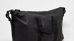 Rains 14200 unisex waterproof weekend duffel bag in black | ASOS