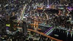 Free Video Stock tokyo iluminated cityscape and river at night Live Wallpaper