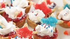 enjoy a special red, white and blue treat on 4th of july! 🇺🇸 these mini pies are a star-spangled delight. ready in only 20 minutes, your guests are sure to feel the fireworks with every bite. ❤️ 🤍 💙 ingredients: 1 box (14.1 oz) refrigerated pie crust (2 count), softened as directed on box 1 cup cherry pie filling with more fruit (from 21-oz can) 1 cup blueberry pie filling with more fruit (from 21-oz can) 2 teaspoons red, white or blue decorating sugar 1/2 cup cool whip frozen whipped toppin
