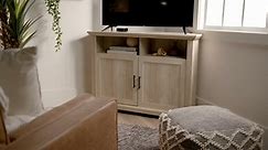 Welwick Designs 44 in. White Oak Wood Corner TV Stand with adjustable shelf and doors (Max tv size 50 in.) HD8377