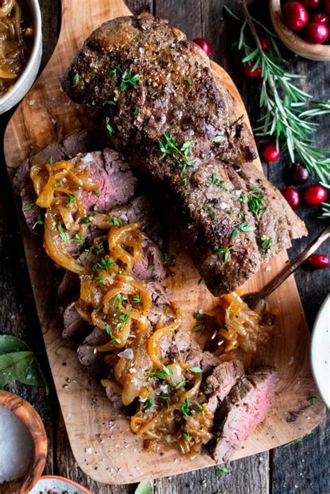 An easy and elegant dinner beef tenderloin is a long cylindrical muscle that is found in the loin near the backbone. Roasted Beef Tenderloin with French Onions & Horseradish Sauce - The Original Dish
