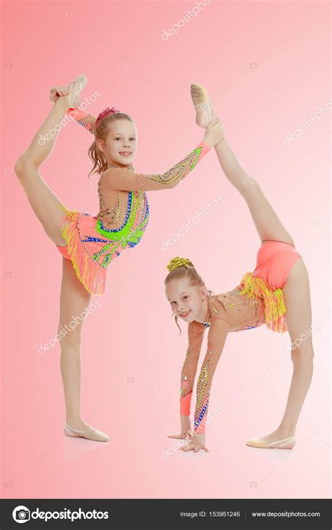 Put the words into the correct columns. Two girls gymnast sitting on splits. — Stock Photo ...