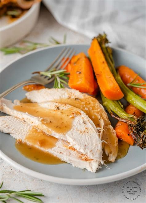 A roast chicken dinner is a hugely popular meal worldwide. GARLIC HERB ROASTED CHICKEN