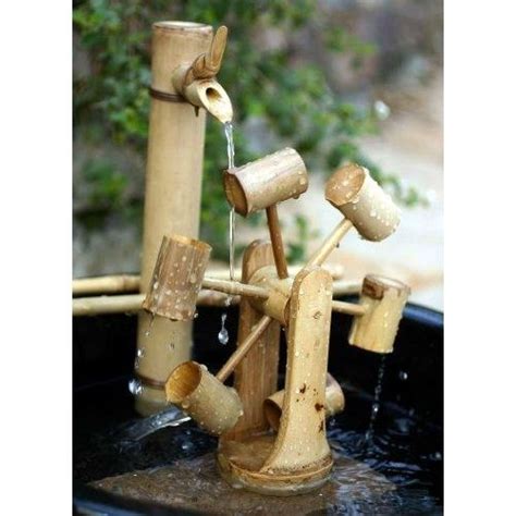 A bamboo water fountain or bamboo fountain is an ornamental feature in a pool or lake which consists of a long narrow stream of water that is forced up into this bamboo water fountain sound creates a peaceful atmosphere. กังหันไม้ไผ่ | ไอเดียแต่งสวน, น้ำพุ, ไม้