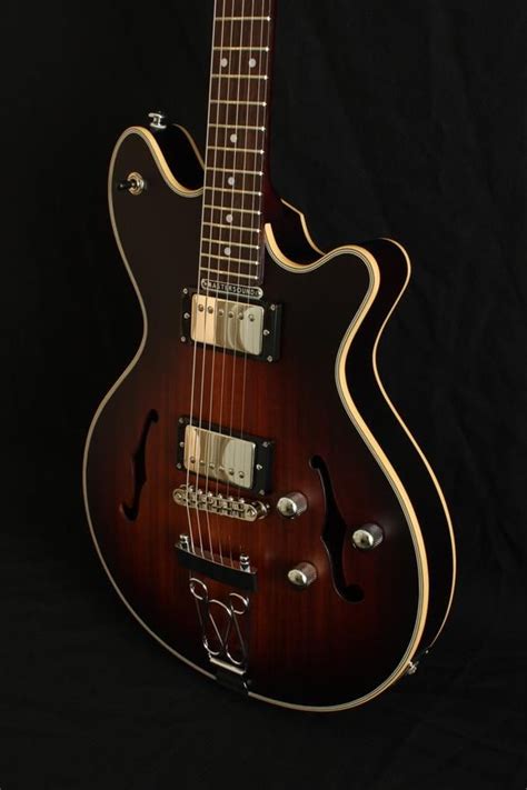 Maybe you would like to learn more about one of these? Another guitar I'd consider but will never find or afford ...