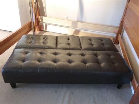 Imagine the convenience of converting your sofa to a bed in a snap. LEATHER FUTON | Delmarva Furniture Consignment